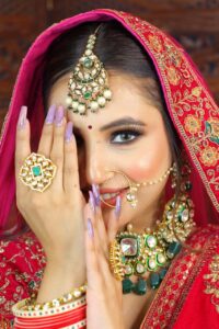 Professional makeup artist applying flawless bridal makeup using premium products, highlighting the importance of hiring a professional makeup expert for a perfect look.| NS MAKEUP STUDIO